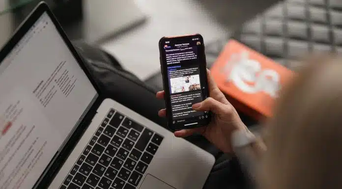 person holding black iphone 4